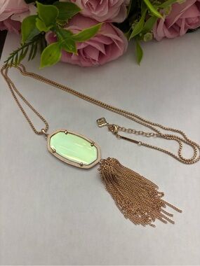 NWOT Kendra Scott Rayne long necklace in Rose gold dichroic glass.